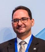 Photo of Professor Stavros Stavrou wearing suite and tie