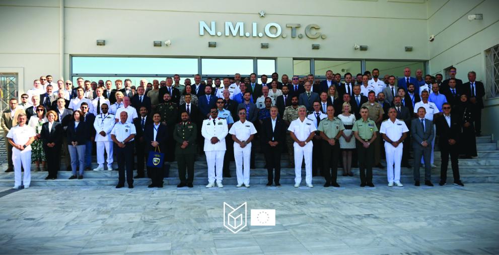 Group picture. Many military uniforms, especially Navy. About 50 people.