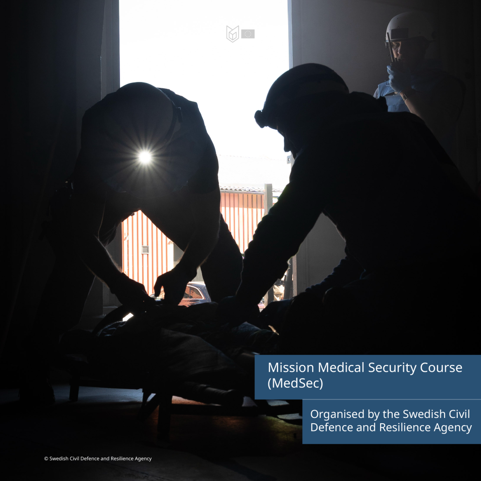 Multiple people in the dark with flash lights on their helmet helping an injured person laying down. The text on the picture reads: Mission Medical Security Course (MedSec) organised by the Swedish Civil Defence and Resilience Agency