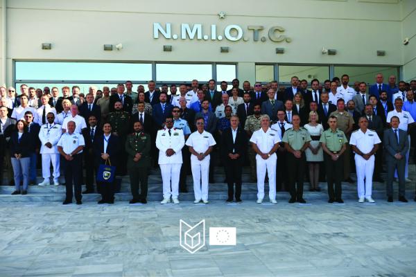 Group picture. Many military uniforms, especially Navy. About 50 people.